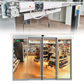 Compact rail track mounted sensor glass door operators